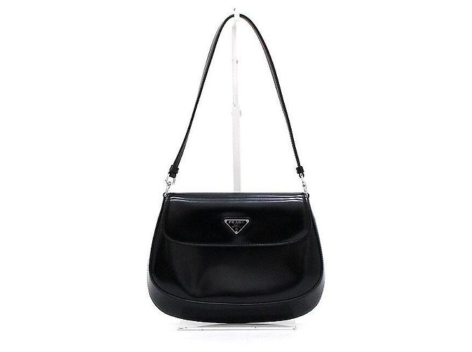 Prada Borsa a tracolla Cleo in pelle spazzolata con patta Nera