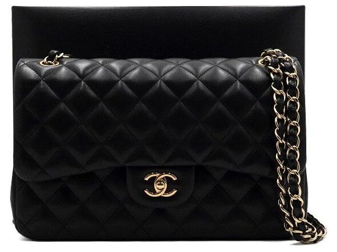 Chanel Bolsa de ombro com corrente dourada Preto