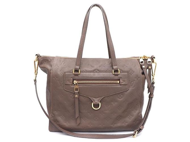 Louis Vuitton Borsa a mano e a tracolla Monogram Empreinte Lumineuses PM Marrone