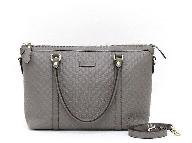 Gucci mala de mão e de ombro em couro Micro GG Cinza Marrom