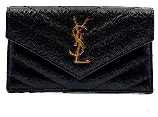 Saint Laurent Tarjetero con solapa Monogram Negro