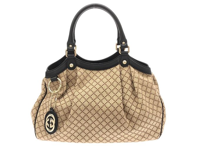 Sac à main Gucci en toile beige