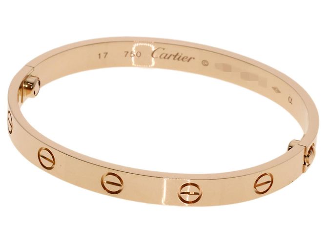 Pulsera de amuletos Cartier en oro rosa de 18K