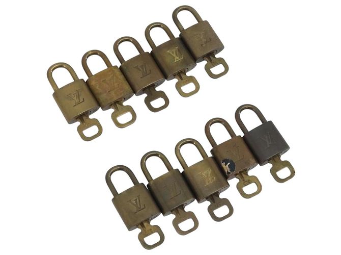 LOUIS VUITTON Set di 10 Lucchetti Lucchetto metallo Gold LV Auth 192565 D'oro