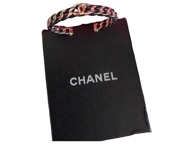 Bracciale rigido Chanel in pelle e metallo dorato Nero D'oro