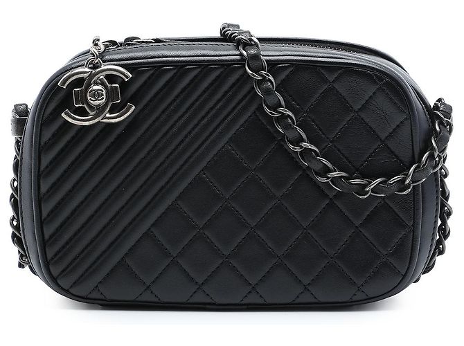 Bolsa Chanel Coco Boy Camera Small em pele de cordeiro acolchoada preta Preto