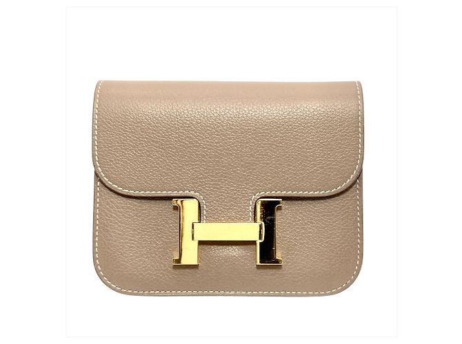 Hermès Carteira bi-fold Hermes Constance Slim Marrom Taupe