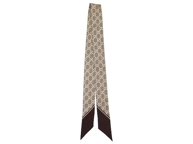Gucci Laço de pescoço em seda com estampa laminada Castanho Marrom
