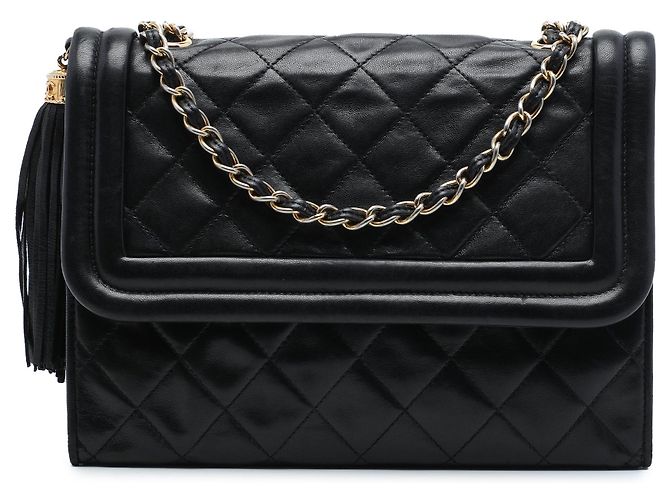 Borsa a tracolla Chanel in pelle d'agnello matelassé nera con nappina Nero