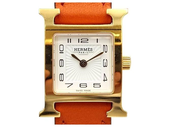 Hermès Relógio Hour de duas pulseiras banhado a ouro Dourado