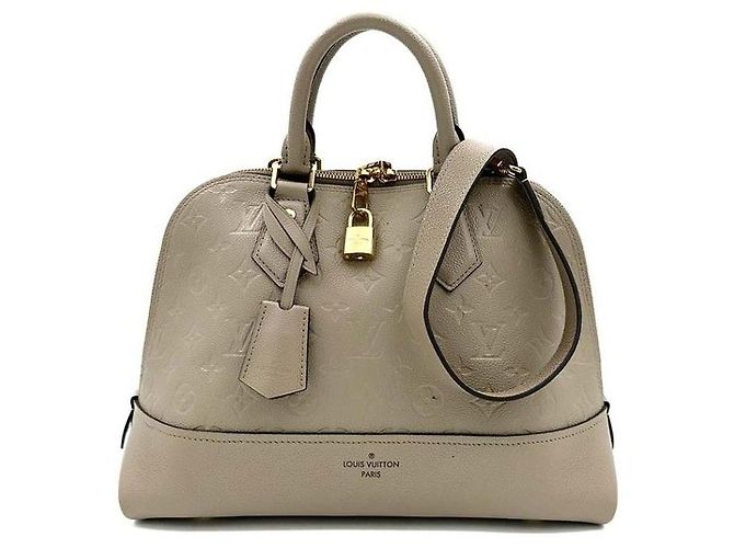 Louis Vuitton Monogram Empreinte Neo Alma PM Marron