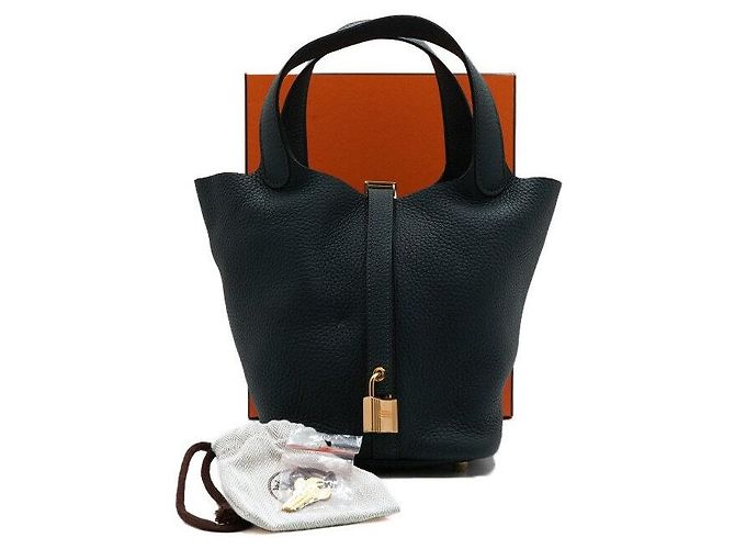 Hermès Saco tote Picotin Lock em tom dourado Preto
