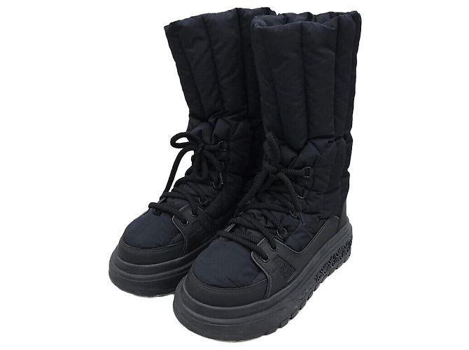 Louis Vuitton Limited Edition Monogram Puffer Boots Black