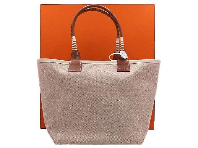 Hermès Bolso Tote Steeple de lona écru Blanco