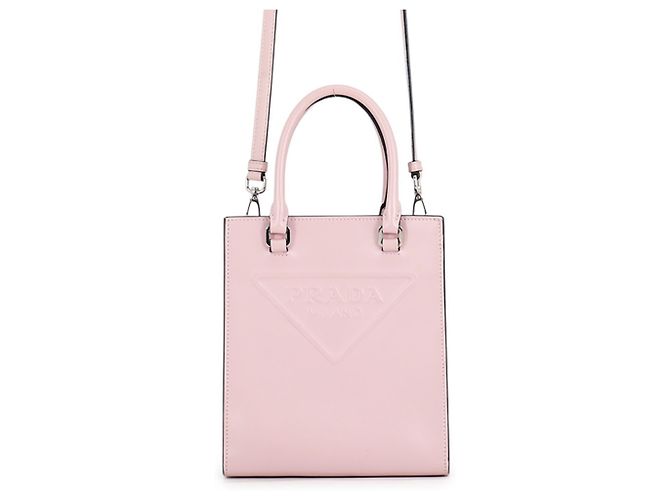 Mini sac à main en cuir Prada avec triangle embossé Rose