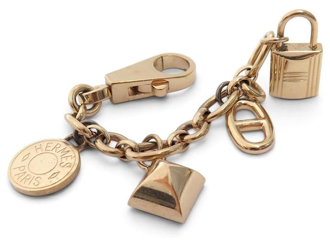 Hermès BIJOU DE SAC HERMES OLGA BRELOQUES CADENAS KELLY CHAINE ANCRE DORE PORTE CLES Doré 