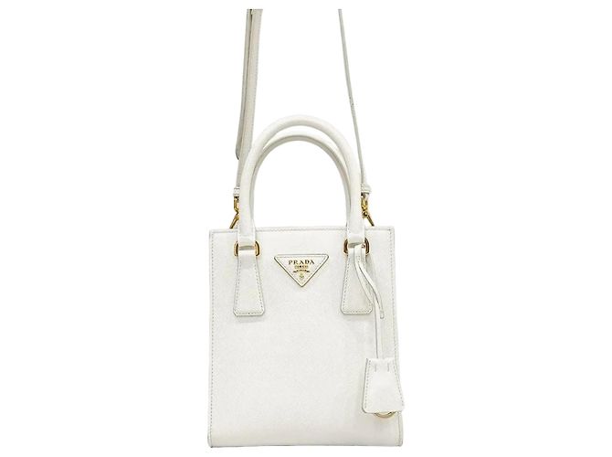Prada Mini mala tote crossbody em couro Saffiano branco