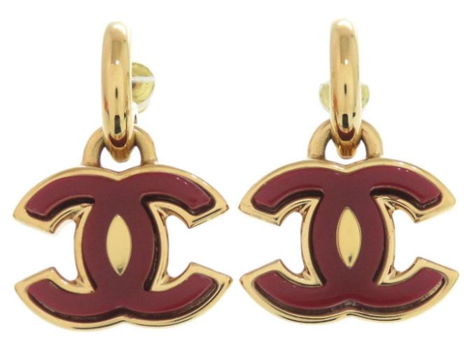 Orecchini Chanel Coco Mark in metallo rosso e oro D'oro