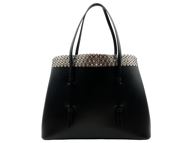 Tote em couro preto com ilhoses Alaïa