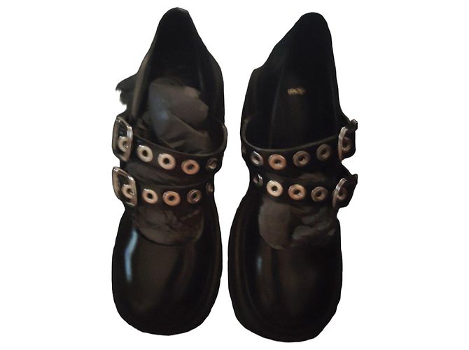 Maje Sapatos Mary Jane pretos com fivela dupla e ilhoses