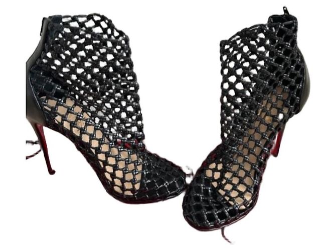 Botines Christian Louboutin de cuero negro