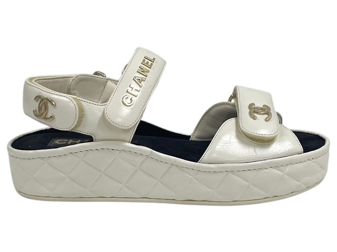 Chanel Sandali ciabatte bianchi con logo CC e velcro Bianco