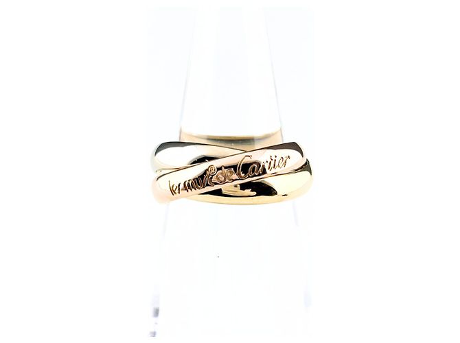Anillo Cartier Trinity en oro blanco oro amarillo y oro rosa