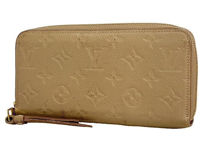 Portafoglio Zippy Louis Vuitton Monogram Empreinte Taupe