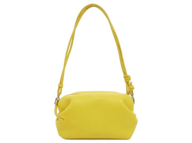 Bolsa de mão Christian Dior com laço Amarelo
