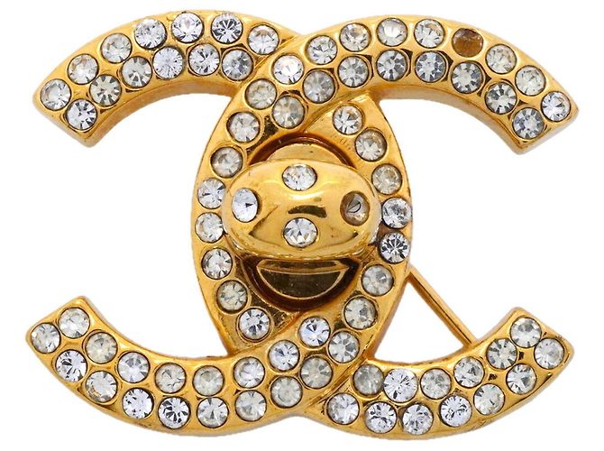 Broche Chanel banhada a ouro com strass Dourado
