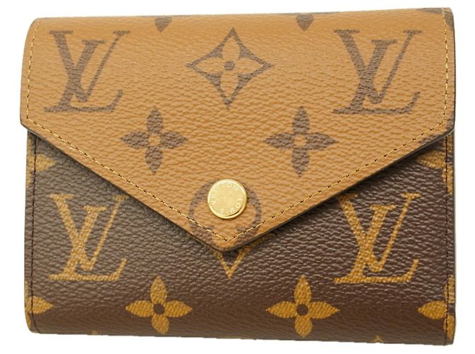 Cartera Louis Vuitton Tri-fold Castaño