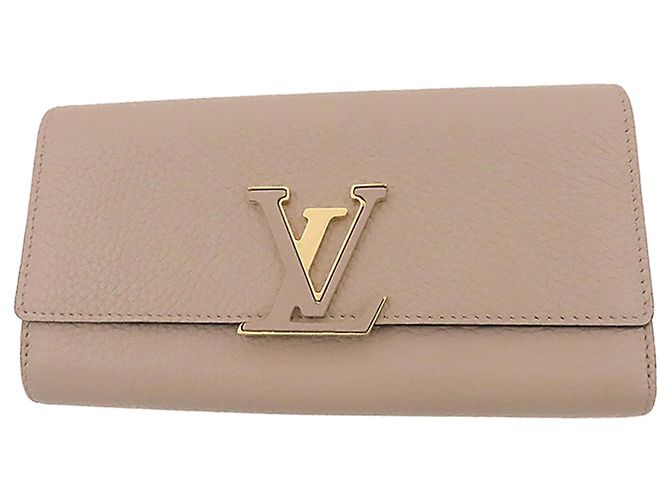 Portafoglio lungo Louis Vuitton Capucines in pelle Taurillon beige