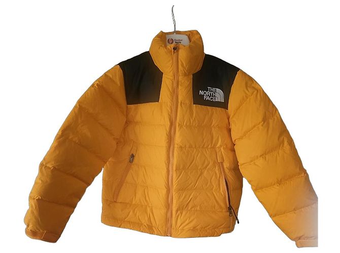 Doudoune The North Face Jaune Noir
