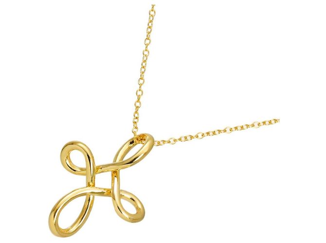 Collar largo Tiffany & Co. Infinity Cross en oro amarillo de 18K