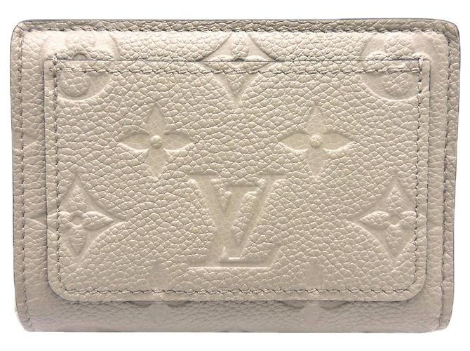 Cartera bi-fold Louis Vuitton Empreinte Beige