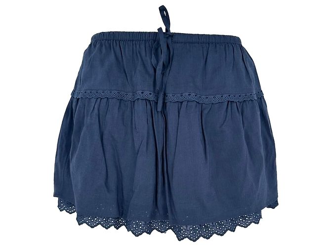 Minifalda de algodón azul marino con borde de encaje Reformation