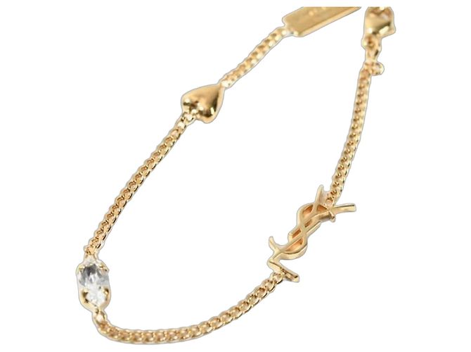 Saint Laurent Pulsera con dije de corazón Dorado