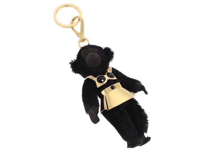 Charm Gorilla PRADA in metallo nero e oro Auth 196726M