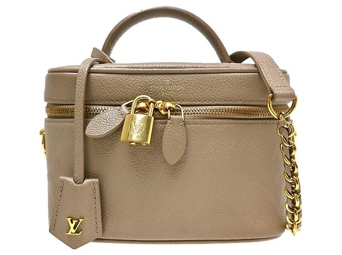 Louis Vuitton Vanity Monogram Empreinte Giant PM Bege