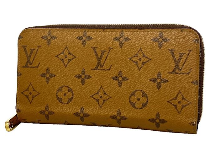 Cartera Zippy Monogram Reverse Louis Vuitton Castaño