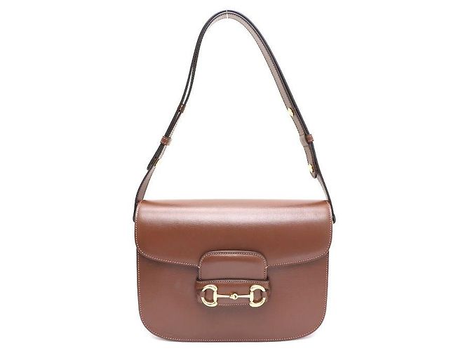 Gucci Bolsa de ombro e bolsa transversal em couro marrom com mors