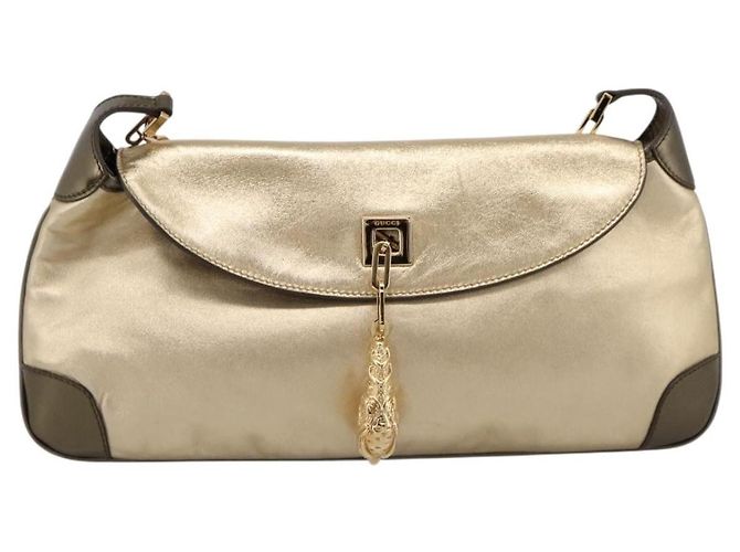 Gucci Tiger Charm Leather Dourado