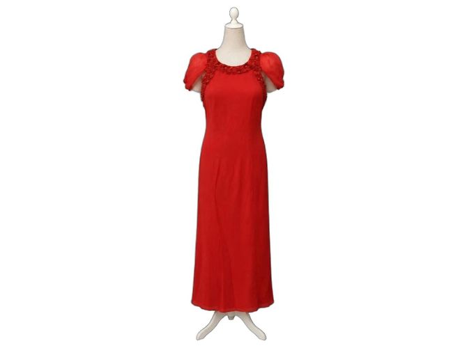 Paule Ka Abito lungo rosso decorato con perle e fiocchi