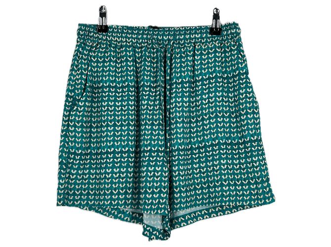 Autre Marque Türkise gemusterte Shorts Blau
