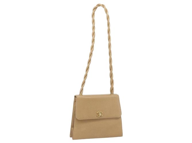 Bolsa de Ombro CHANEL em couro caviar bege e dourado CC