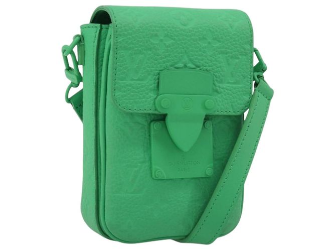 LOUIS VUITTON Lock Vertical Wearable Wallet M81525