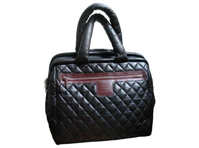 Chanel Cocoon Trolley aus schwarzem gestepptem Lammleder