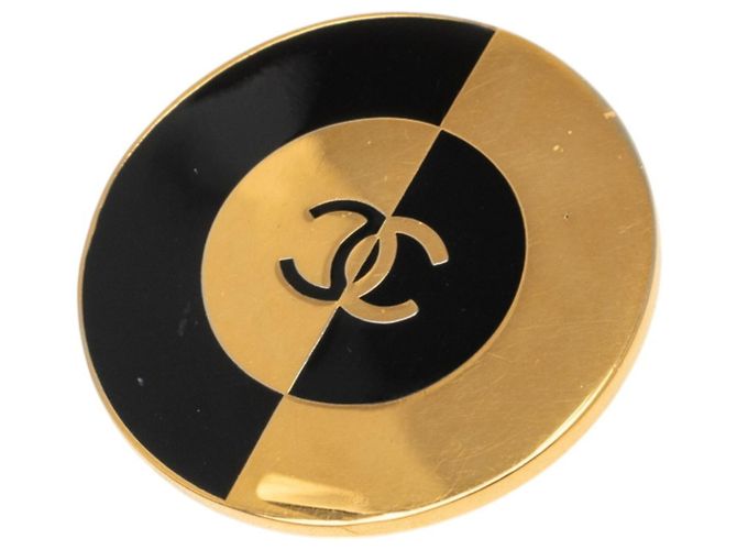 Spilla Chanel Coco Mark in nero e oro D'oro