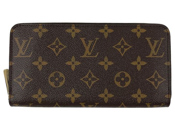 Cartera Zippy Louis Vuitton Castaño Fucsia