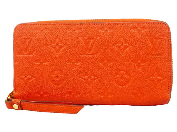 Louis Vuitton Monogram Empreinte Zippy Wallet Fuschia